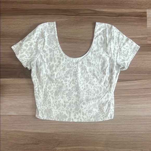 lululemon athletica Tops - Lululemon White/Grey Cheetah Crop Top